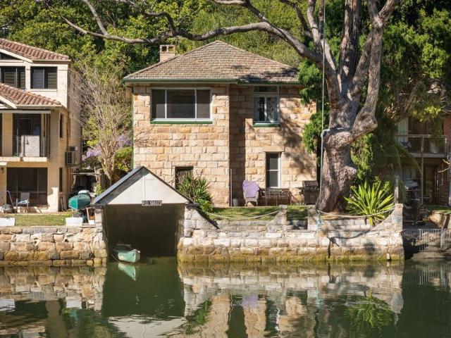 Original sandstone landmark with absolute river frontage