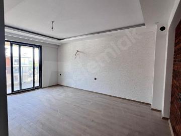 ORTACA ERSOY EMLAK'TAN KARABURUN'DA 2+1 KİRALIK SIFIR DAİRE