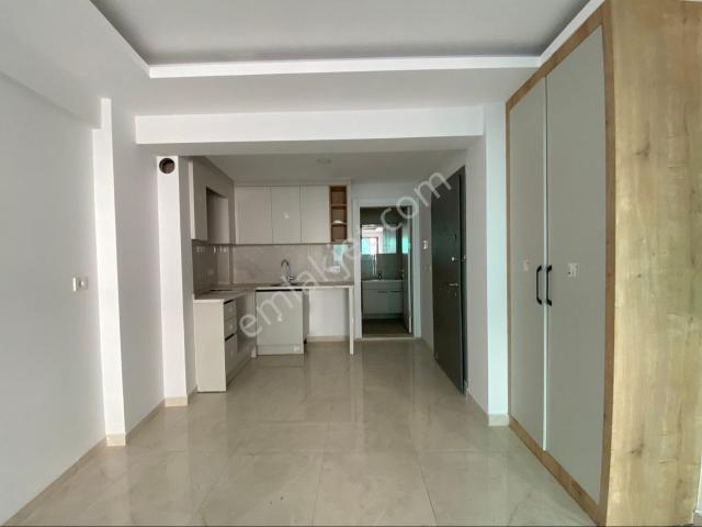 Ortaca Merkezde Satılık Sıfır Lüks 1+1 Asansörlü Daire