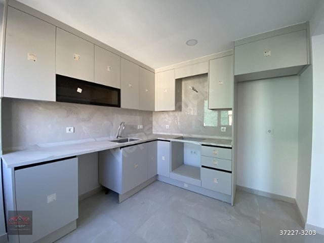 Ortaca merkezde satılık sıfır lüks 3+1 Evebeyn banyolu daire