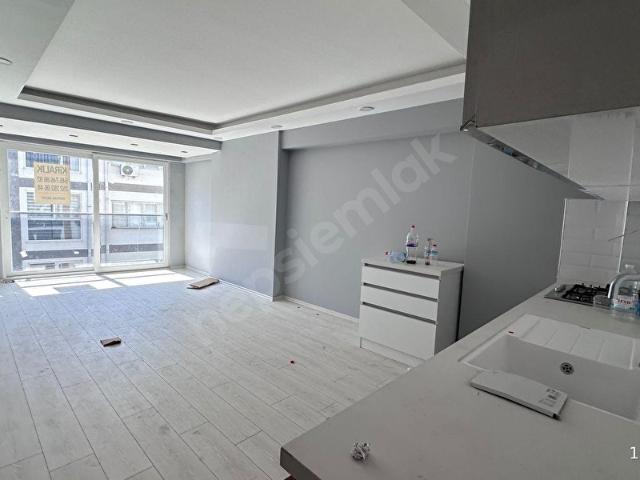 ORTACA'DA ATATÜRK CADDESİNE CEPHE 1+0 SATILIK DAİRE SIFIR BİNA