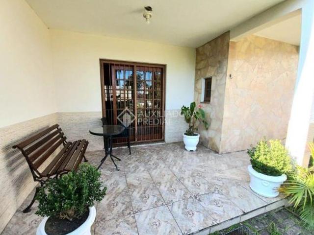 Ótimo terreno com 2 casas no bairro Pedra Redonda