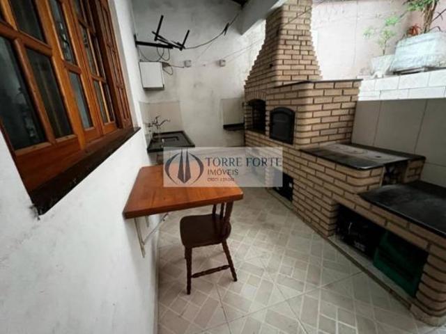 ótimo terreno com 2 casas com total de 3 dormitórios, 6 vagas de carro