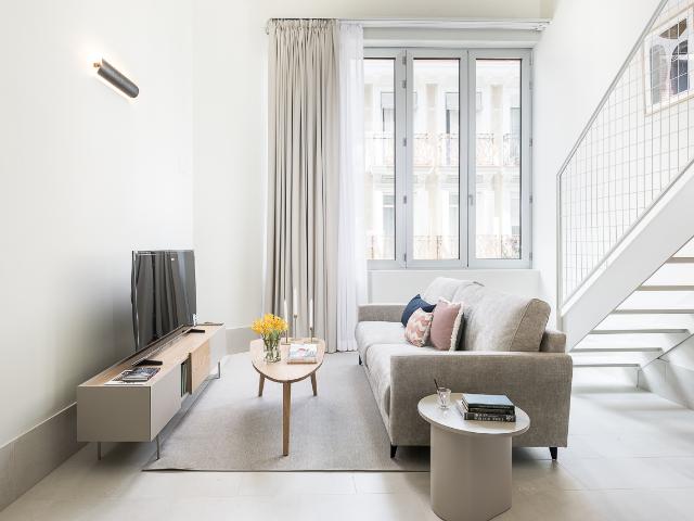 Outward facing one bedroom duplex in a brand new building