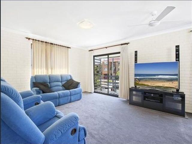 Outstanding three bedroom top floor unit