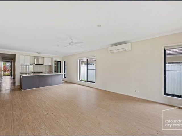OUTSTANDING HOME IN PELICAN WATERS