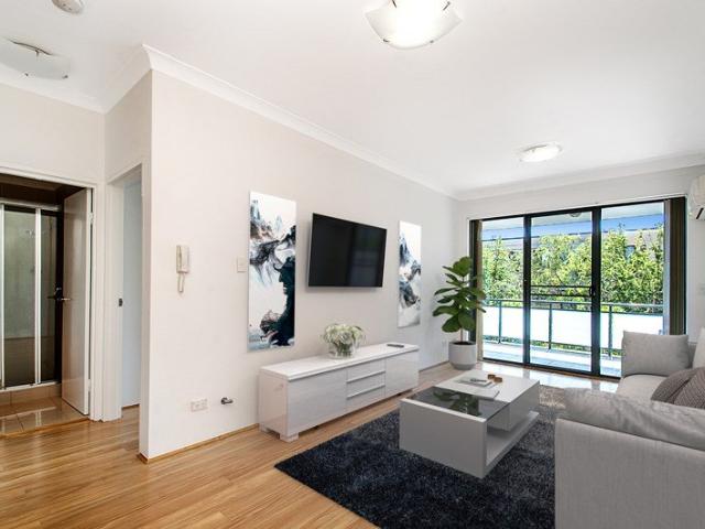 Outstanding Oversized Designer Apartment with Street Views in Fabulous Location