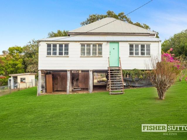 Outstanding Renovation Opportunity with Exceptional Upside