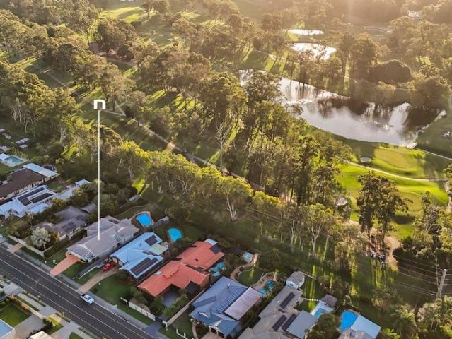 OUTSTANDING REAL ESTATE ON THE GOLF COURSE WITH A SHORT STROLL TO SCHOOL
