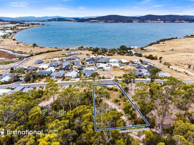 Over Half an Acre with Stunning Views Over Ralph's Bay