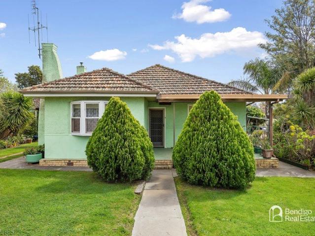 Over Half an Acre and Original Home Near the Lake