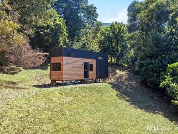 Over half an acre, gorgeous mountain views and a tiny house!