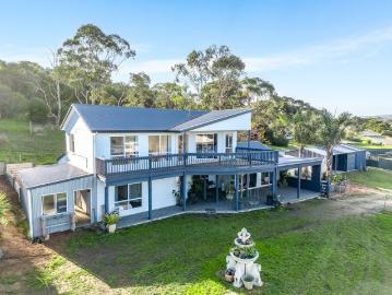 Over Half an Acre of Elevated Coastal Living with Sweeping Ocean Views!