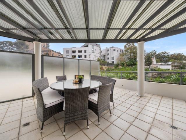 Over sized one bedroom with outdoor terrace and lock up garage