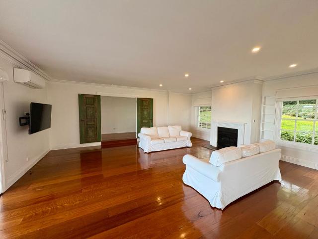 Overlooking Rolling Hills and Farmland with Coastal Views