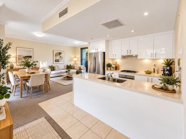 Oversized 2 Bedroom Apartment with Expansive Front & Rear Courtyards