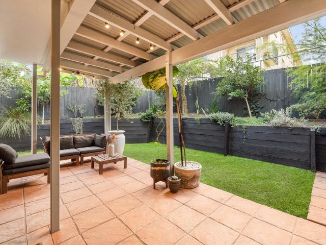 Oversized courtyard living in a boutique complex of just eight