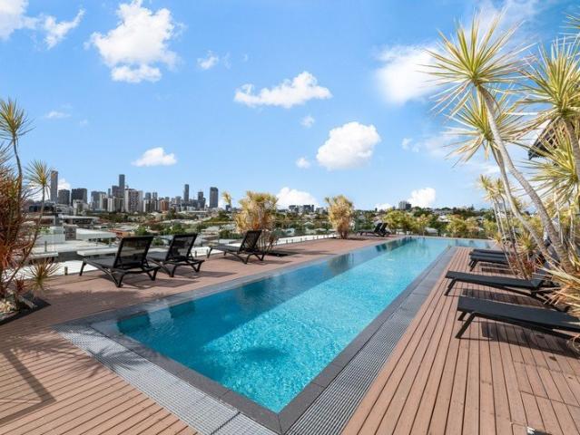 Oversized apartment, rooftop oasis owner committed elsewhere