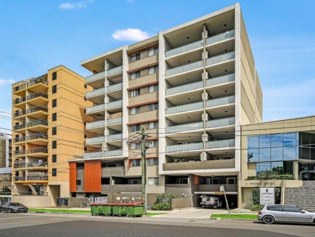 Oversized Apartment with Double Balconies in Ultra Convenient Location with District Views
