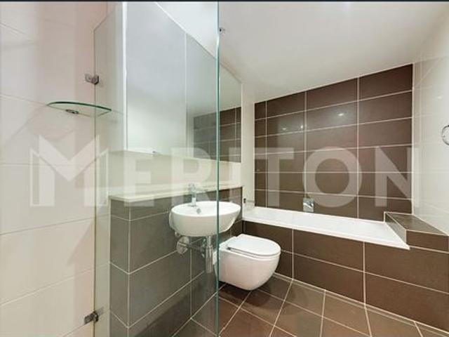 OVERSIZED DESIGNER ONE BEDROOM APARTMENT IN THE HEART OF RHODES!