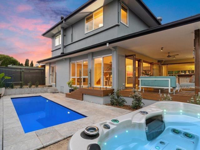 Oversized family home for sunlit poolside entertaining