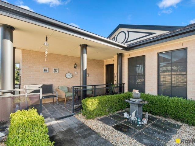 Oversized family home nestled on a private road!
