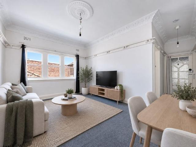 OVERSIZED ONE BEDROOM PLUS STUDY!