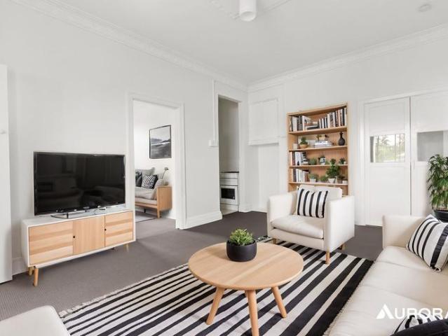 Oversized One Bedroom Unit with Sunroom in Prime Location