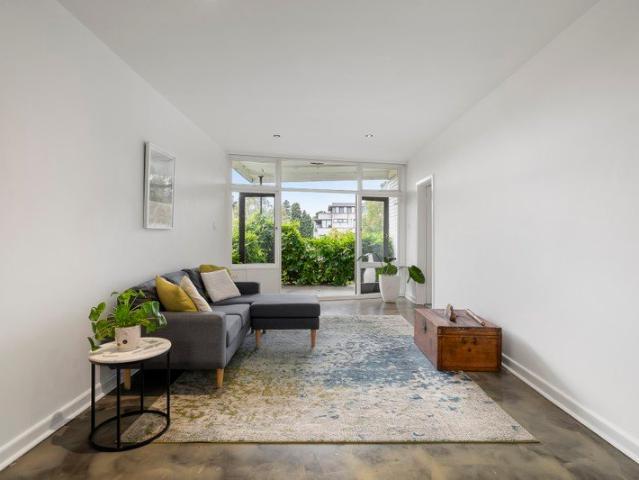 Oversized Mid Century Apartment with House Like Proportions