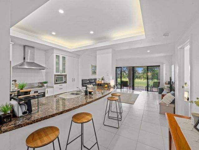 Oversized North Facing Golf Course Apartment in Hope Island Resort
