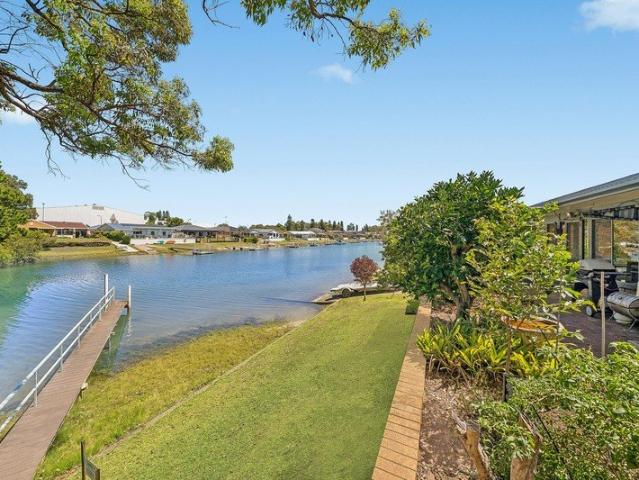 Oversized waterfront villa, in block of just three