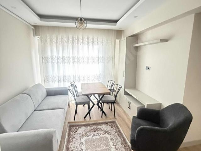 ÖZBAYDAN İSTASYONDA EŞYALI BALKONLU 1+1 KİRALIK