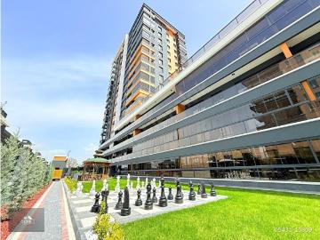 ÖZGÜL EMLAK'tan FULL DONANIMLI ULTRA LÜX SİTEDE YERDEN ISITMALI K.OTOPARKLI 1+1 KİRALIK DAİRE