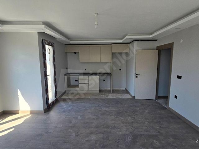 ÖZGÜN EMLAKTAN SAHİLE YAKIN YENİ SİTEDE 2+1 80 m2 SIFIR DAİRE