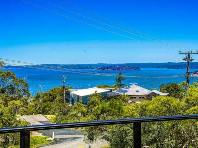 Panoramic Ocean Views and Exceptional Family Space