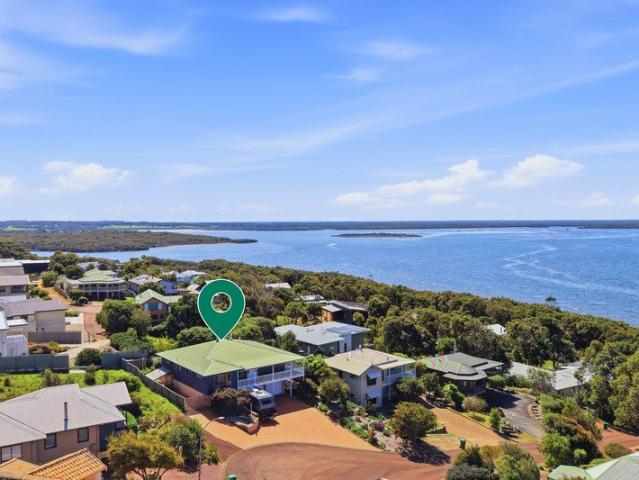 Panoramic Water Views and Versatile Dual Living