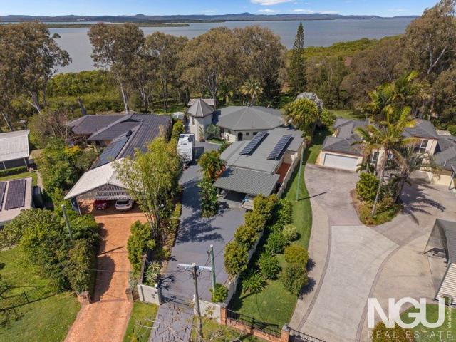Panoramic Water Views in a Peaceful Coastal Setting + Dual Living