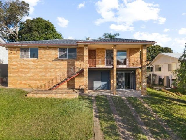Packed with Potential Solid Home, Great Block & Convenient Location