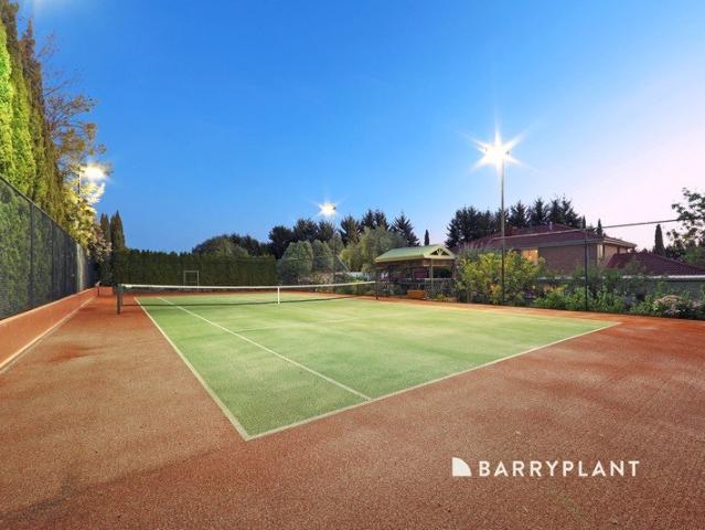 1/2 Acre, tennis court, loads parking