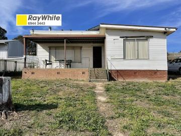 Partially Renovated on a Large Block