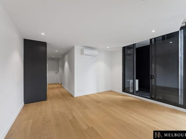 Partly furnished with fridge, washer dryer combo and microwave