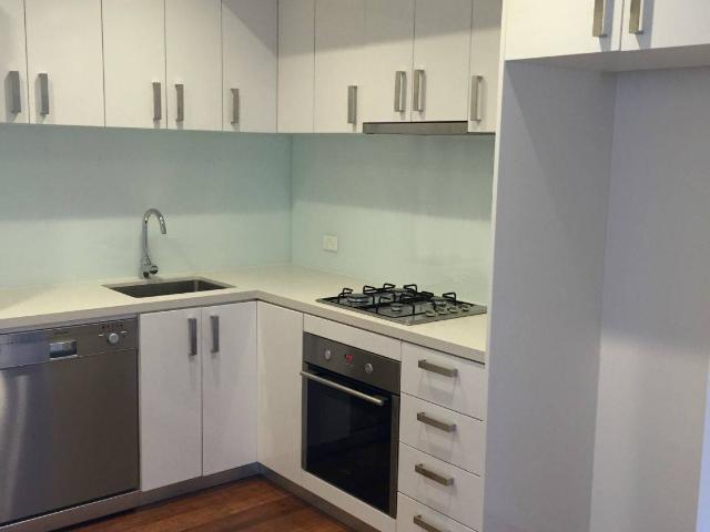 Paragon Real Estate ONE BEDROOM PLUS STUDY APARTMENT