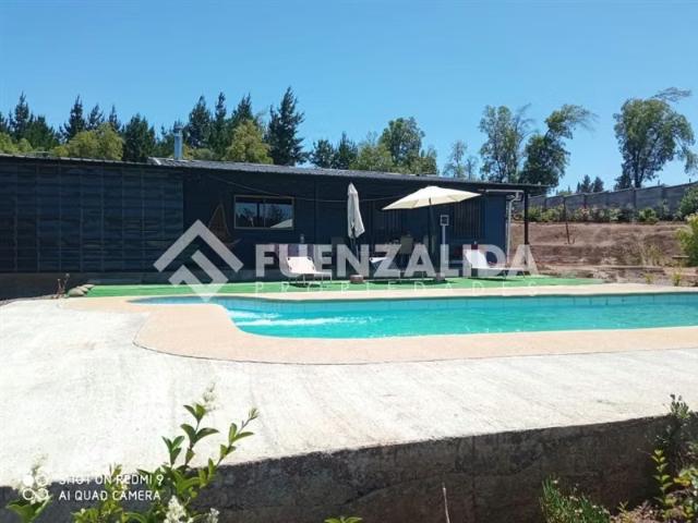 Parcela con casa de 187 m2 + Piscina en Quillón | 4 dormitorios por 3830.00 en Quillón