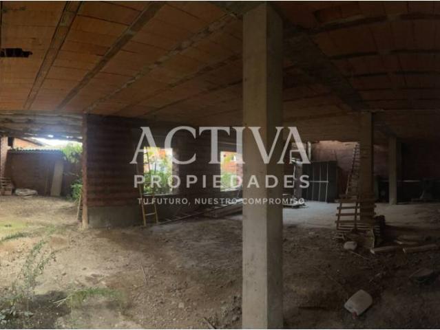 Parcela de 668 m² con edificación en Laguna de Negrillos – Excelente acceso y vistas abiertas