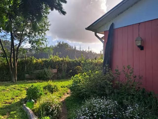 Parcela de 7340 m2 con casa y quincho a orillas del río Donguil | 4 dormitorios por 90000. 00 en Gorbea