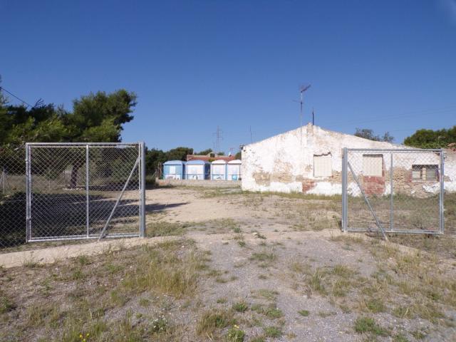 PARCELA RÚSTICA CON CONSTRUCCIÓN