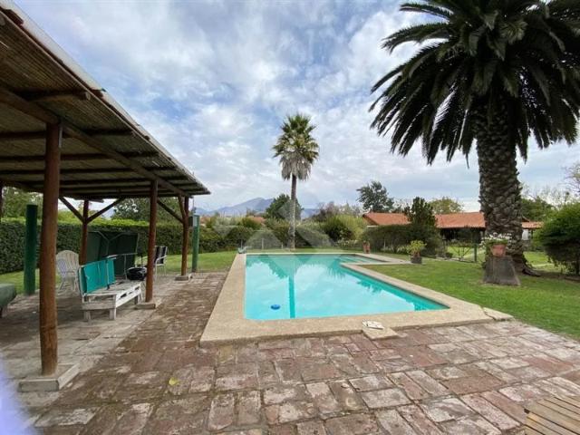 Parcela vendo con 3 casas piscina quincho en Talagante | 4 dormitorios por 11900.00 en Talagante