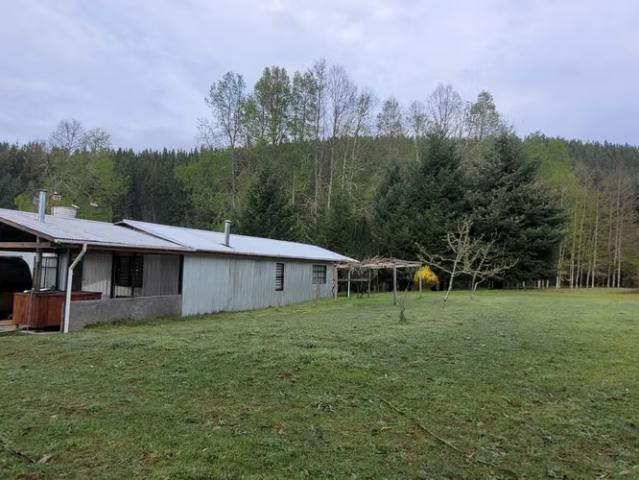Parcela 1 ha con 2 casas, quincho, sauna y tinaja – El Liuco, Gorbea | 5 dormitorios por 145000. 00 en Gorbea