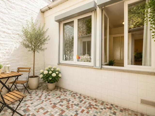 Paris18e Grande Carrière Maison avec jardin Bien unique