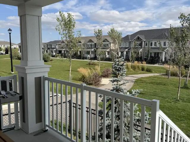 Park facing corner townhome with double attached garage pet friendly
